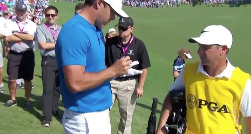 Brooks Koepka signed her glove as an apology