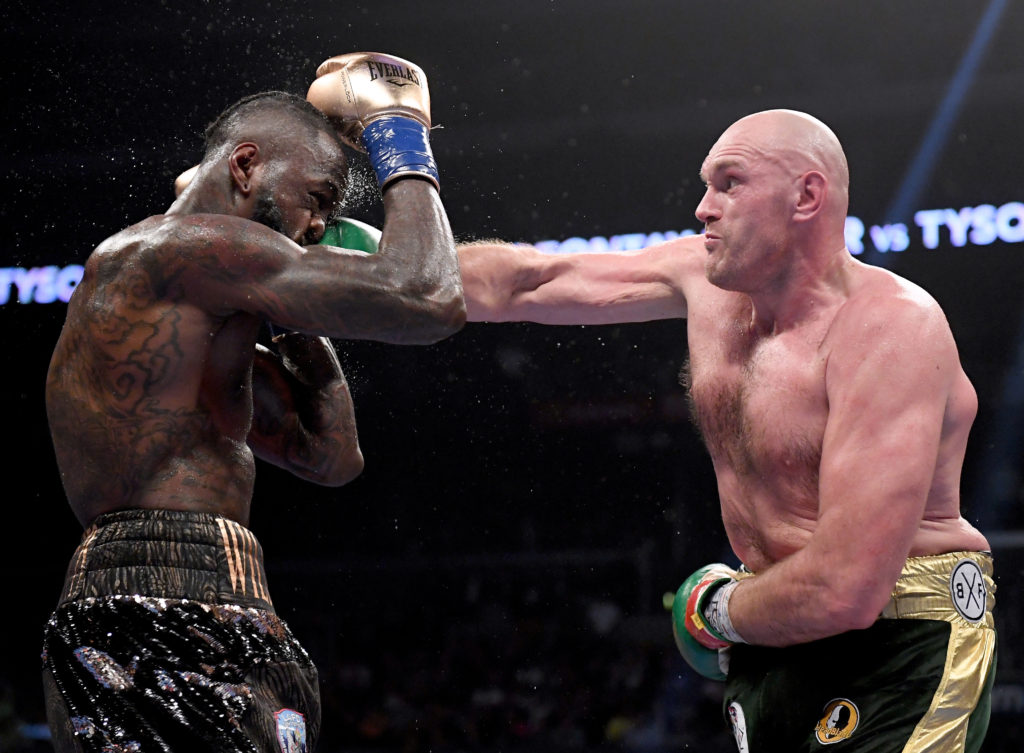 Tyson Fury Defeats Deontay Wilder in 7th Round of WBC heavyweight Title Rematch