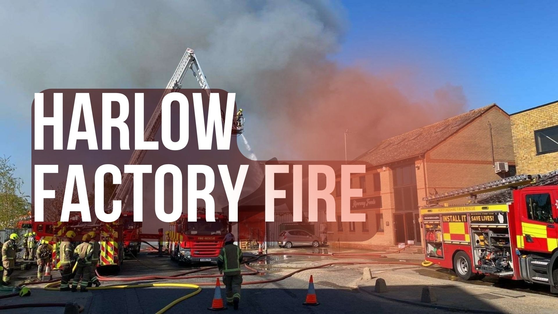 Clouds of smoke engulf Harlow as a factory goes up in flames